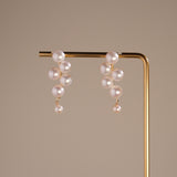 Bridal Edition - Romantic Balloon-Inspired Pearl Earrings | Gift for Her 

These elegant pearl earrings were designed as a personal piece for my own wedding, with the pearls arranged to resemble a bundle of balloons—symbolizing love, hope, and celebration. Now, I’m excited to share this special design with you, hoping it spreads the same joy and romance that it did for me on my special day.
- Round and Smooth Freshwater pearls