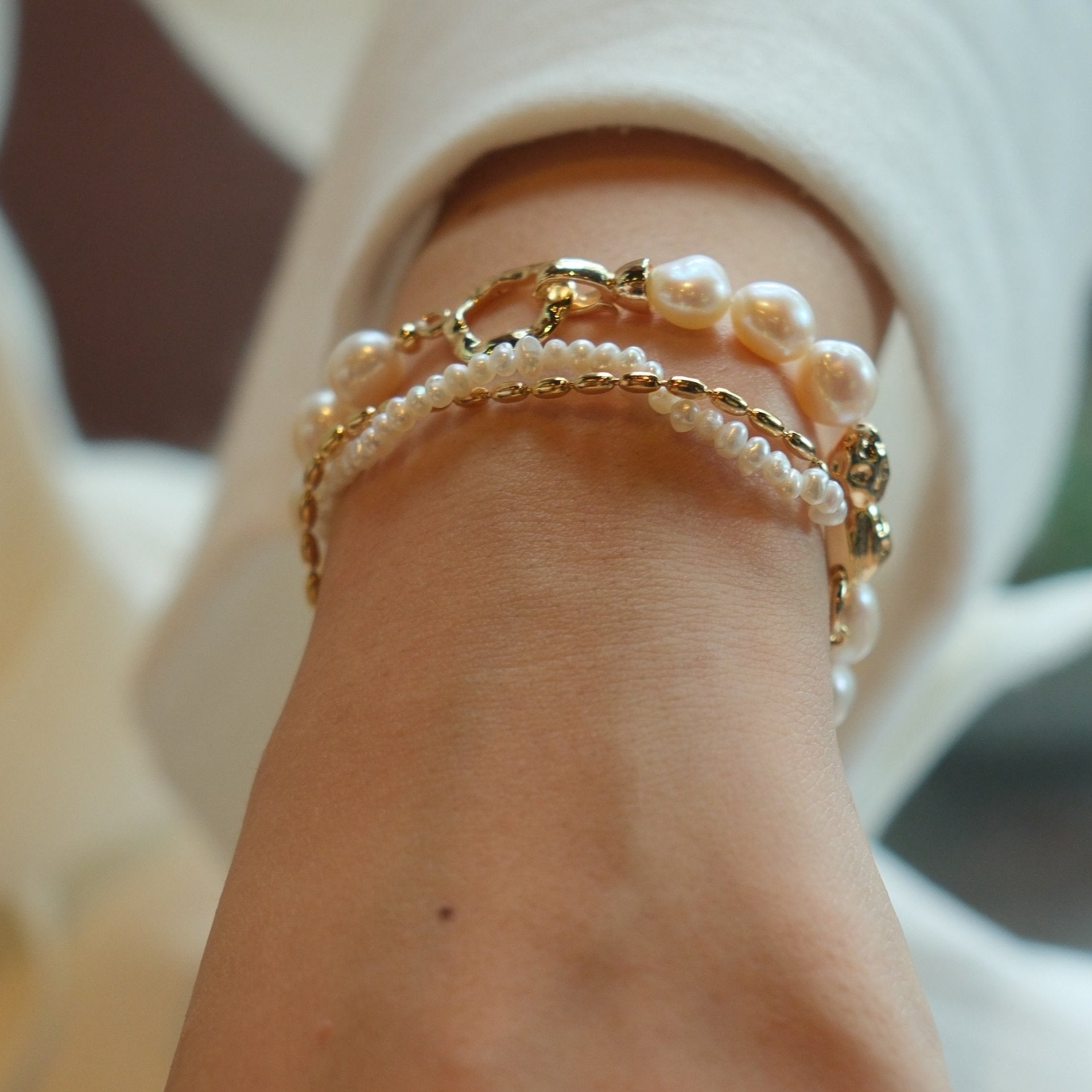 Gold and pearls are a timeless combination that never fails to impress. This delicate pearl bracelet, paired with a matching necklace, makes the perfect accessory duo to elevate any outfit. I’ve included styling references in the listing photos to give you inspiration on how to wear it.
- Pearl Size: 
- Bracelet Length:
- Extension Chain: 
Styling Tips:
Pair this bracelet with its matching pearl necklace for a cohesive, elegant look. It’s perfect for layering with other gold or pearl pieces to add a touch o