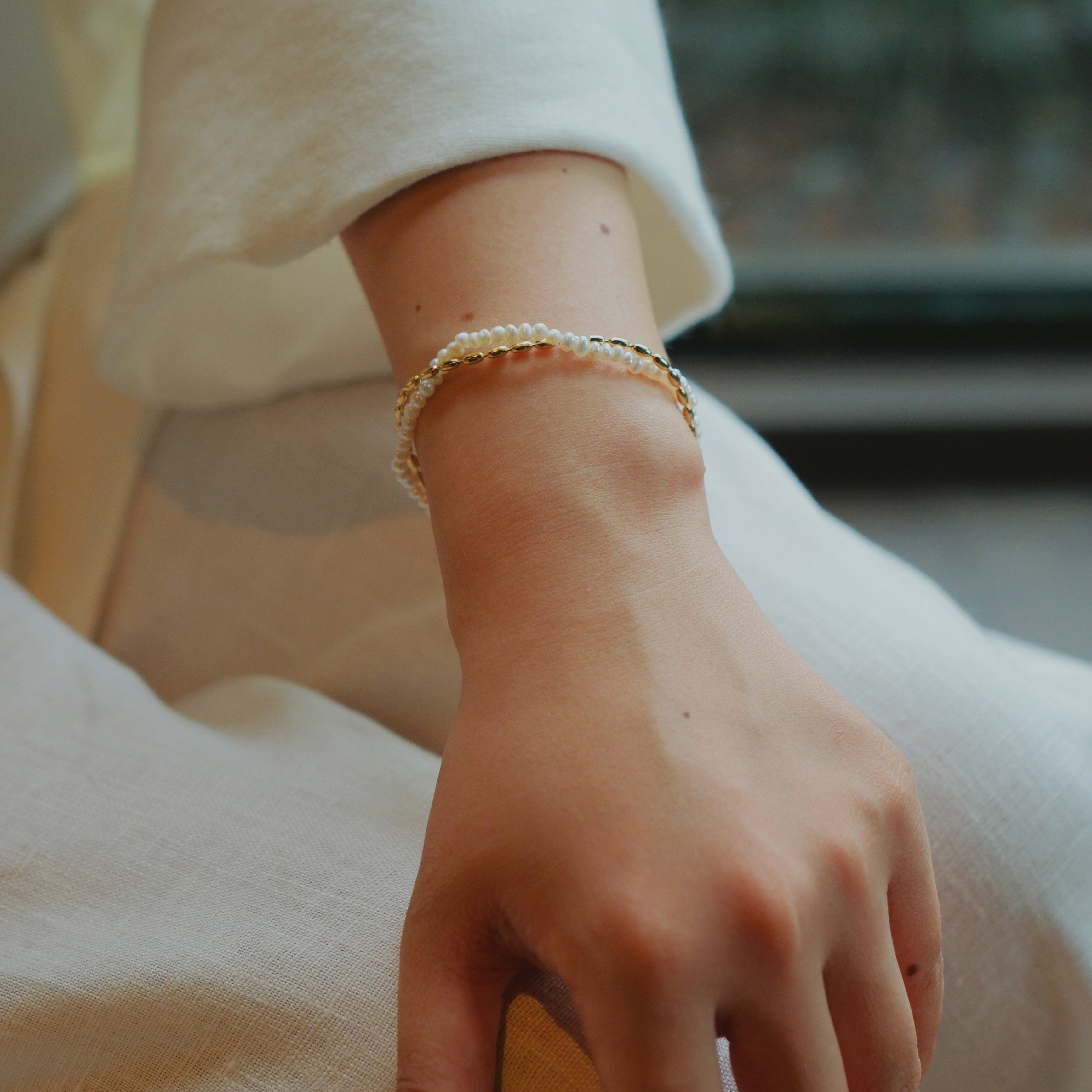 Gold and pearls are a timeless combination that never fails to impress. This delicate pearl bracelet, paired with a matching necklace, makes the perfect accessory duo to elevate any outfit. I’ve included styling references in the listing photos to give you inspiration on how to wear it.
- Pearl Size: 
- Bracelet Length:
- Extension Chain: 
Styling Tips:
Pair this bracelet with its matching pearl necklace for a cohesive, elegant look. It’s perfect for layering with other gold or pearl pieces to add a touch o