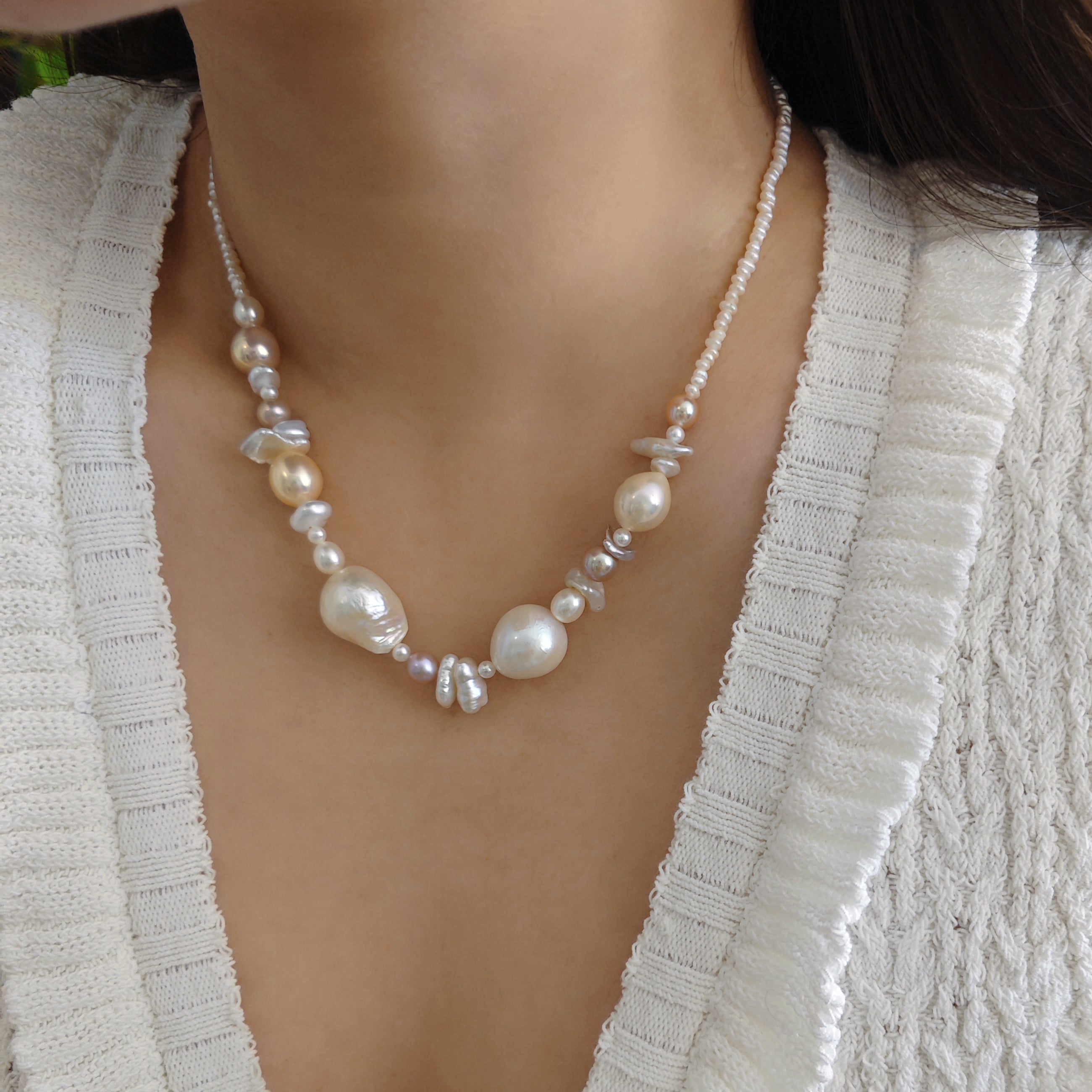 The seaside treasure pearl necklace can be customized to match your favorite color palette! Featuring a stunning mix of pink-hued freshwater pearls—Baroque pearls, Keshi pearls, round pearls, and tiny seed pearls—this necklace is a one-of-a-kind piece. Each strand is handmade with love and care, ensuring that your necklace is truly special and as unique as you are.

The Meaning Behind Pink Pearls & Baroque Pearls