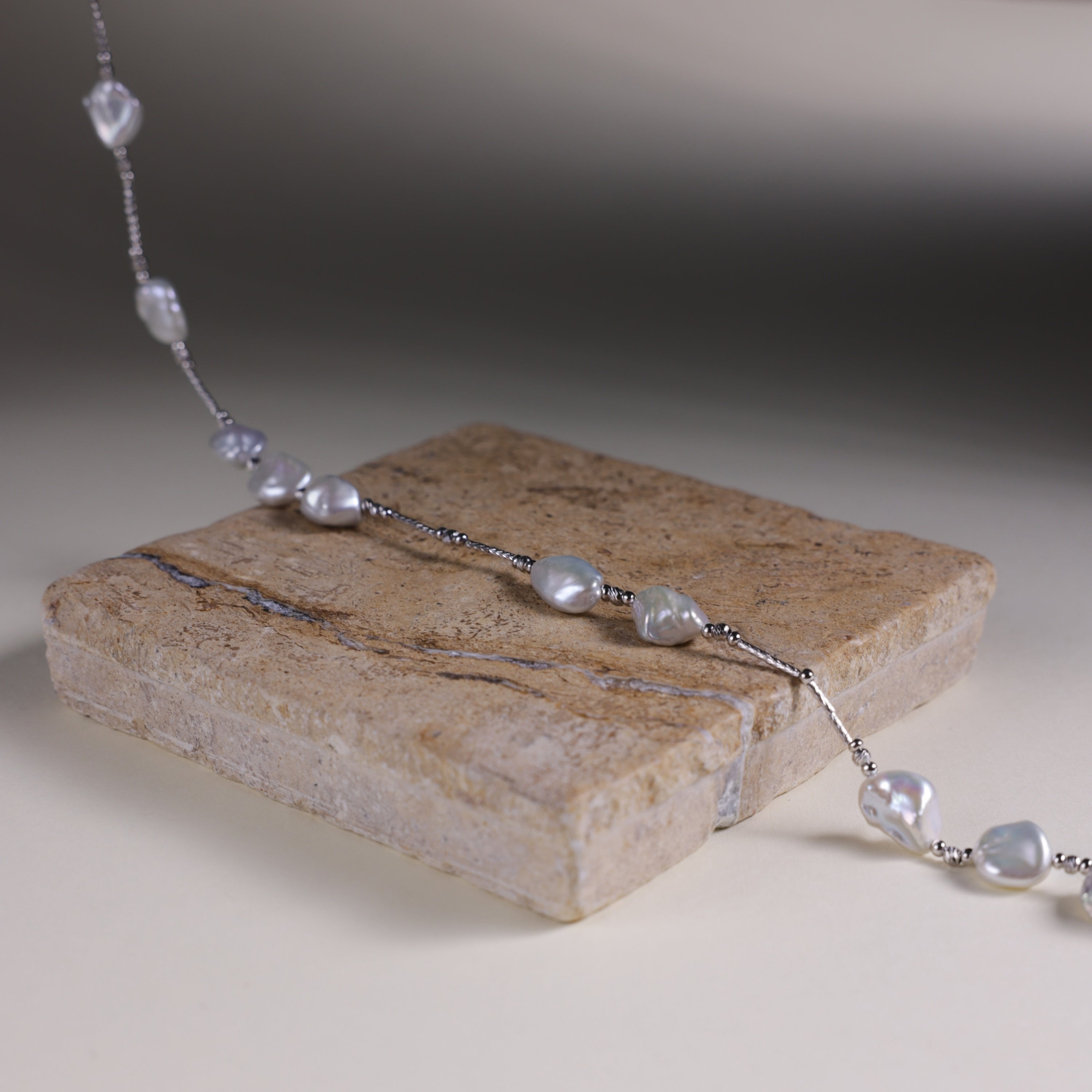 Elegant Keshi Pearl Necklace with Fine 925 Sterling Silver Accents | Real Freshwater Pearls | Christmas gift for her, birthday gift for women
Materials:
- 15 Keshi Pearls: Known for their irregular shapes and exquisite luster.
- 925 Sterling Silver Accents: Provides a durable and stylish framework that enhances the pearls' natural beauty.
- Length: Approximately 40 cm, designed to sit perfectly around the base of the neck.
Gift Idea: 
The Keshi Pearl Necklace makes a perfect gift for special occasions like 