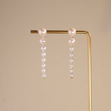 These elegant earrings are made with eight beautifully round and smooth Freshwater Akoya pearls, arranged from largest to smallest. The lustrous pearls will add a delicate and sophisticated touch to your outfit, whether it’s for a casual day or a special evening event. Each pearl’s natural beauty is sure to catch the light and enhance your look.
Materials & Craftsmanship: We use only the finest Freshwater Akoya pearls, carefully selected for their luster and quality. Each pair of earrings is handmade with a