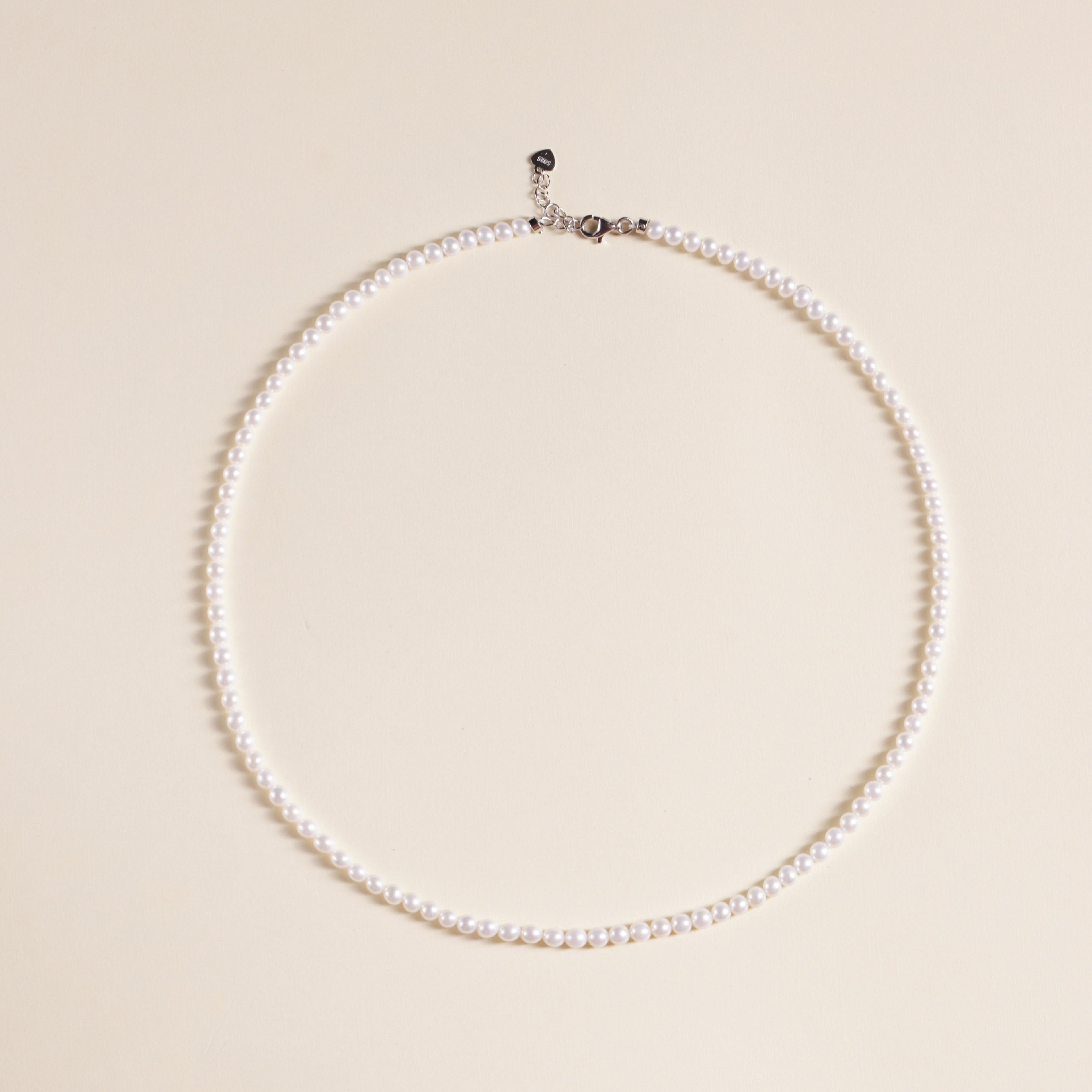 Product Description: This beautiful set of two freshwater pearl necklaces is designed to be worn together or separately for an effortlessly chic layered look. The necklaces feature smooth, round pearls with a radiant luster that will add sophistication to any outfit. Whether you’re dressing up for an event or adding a touch of elegance to your everyday style, these pearl necklaces are perfect for enhancing your wardrobe.
Materials & Craftsmanship: Handcrafted with the finest natural freshwater pearls, each 