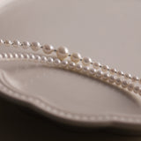 Product Description: This beautiful set of two freshwater pearl necklaces is designed to be worn together or separately for an effortlessly chic layered look. The necklaces feature smooth, round pearls with a radiant luster that will add sophistication to any outfit. Whether you’re dressing up for an event or adding a touch of elegance to your everyday style, these pearl necklaces are perfect for enhancing your wardrobe.
Materials & Craftsmanship: Handcrafted with the finest natural freshwater pearls, each 