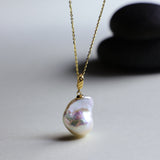 This beautiful necklace features a stunning Baroque freshwater pearl pendant with an exceptional luster. The pendant is removable, allowing you to mix and match it with other necklaces from your collection. The chain is gold-filled, offering lasting color and shine, making this a versatile and timeless addition to your jewelry box.
The Meaning of Baroque Pearls: Baroque pearls, with their unique and irregular shapes, symbolize individuality and natural beauty. Each pearl is one-of-a-kind, representing the u