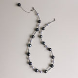 Tahitian black pearls are symbols of mystery, independence, and strength, while blue Akoya pearls represent serenity, elegance, and beauty. Together, they make this necklace not only a fashionable statement but also a meaningful piece that celebrates both bold individuality and refined grace.