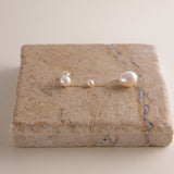 These elegant pearl drop earrings feature a gentle, cascading design of three pearls, meant to reflect the beauty of water droplets splashing into a serene surface. Crafted to add a soft glow to your look, these earrings symbolize vitality and positivity, reminding the wearer to approach life with energy and grace.
Materials & Craftsmanship: Each pair is handcrafted with care using lustrous freshwater pearls and high-quality, durable materials. We ensure every detail is perfected to create a radiant and lon