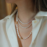 Freshwater Pearl Necklace and Bracelet Set | Versatile and Elegant | 18K Gold Filled | Gift for Her | Fall Outfit 
This set, featuring a smooth and lustrous collection of natural freshwater pearls, offers endless styling possibilities. Wear the necklace and bracelet separately or connect the clasps to create a chic long necklace. This versatile design is not only fun to wear but can be layered with one of our baroque pearl necklaces to create a more luxurious look. Whether worn individually or combined, the