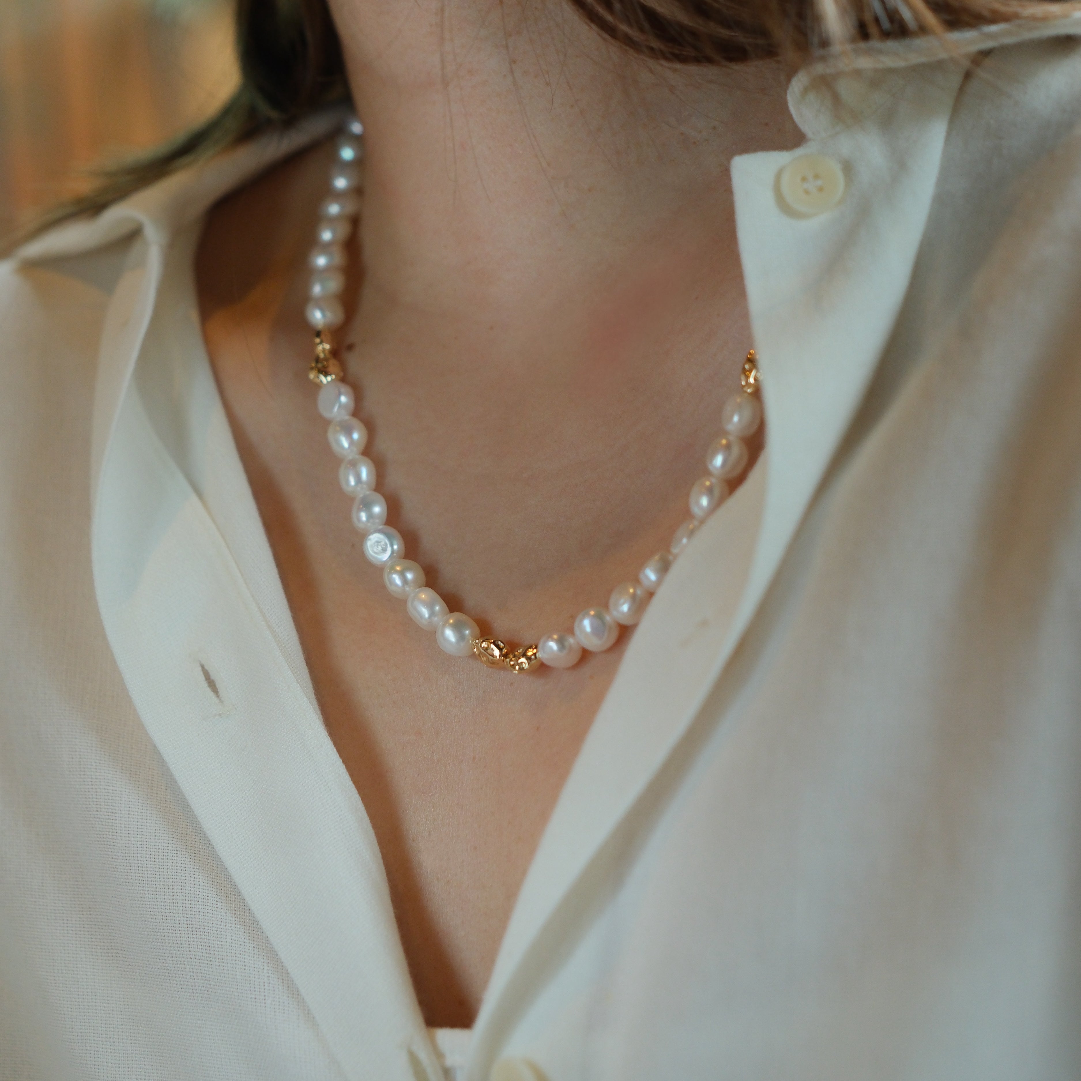 Freshwater Pearl Necklace and Bracelet Set | Versatile and Elegant | 18K Gold Filled | Gift for Her | Fall Outfit 
This set, featuring a smooth and lustrous collection of natural freshwater pearls, offers endless styling possibilities. Wear the necklace and bracelet separately or connect the clasps to create a chic long necklace. This versatile design is not only fun to wear but can be layered with one of our baroque pearl necklaces to create a more luxurious look. Whether worn individually or combined, the