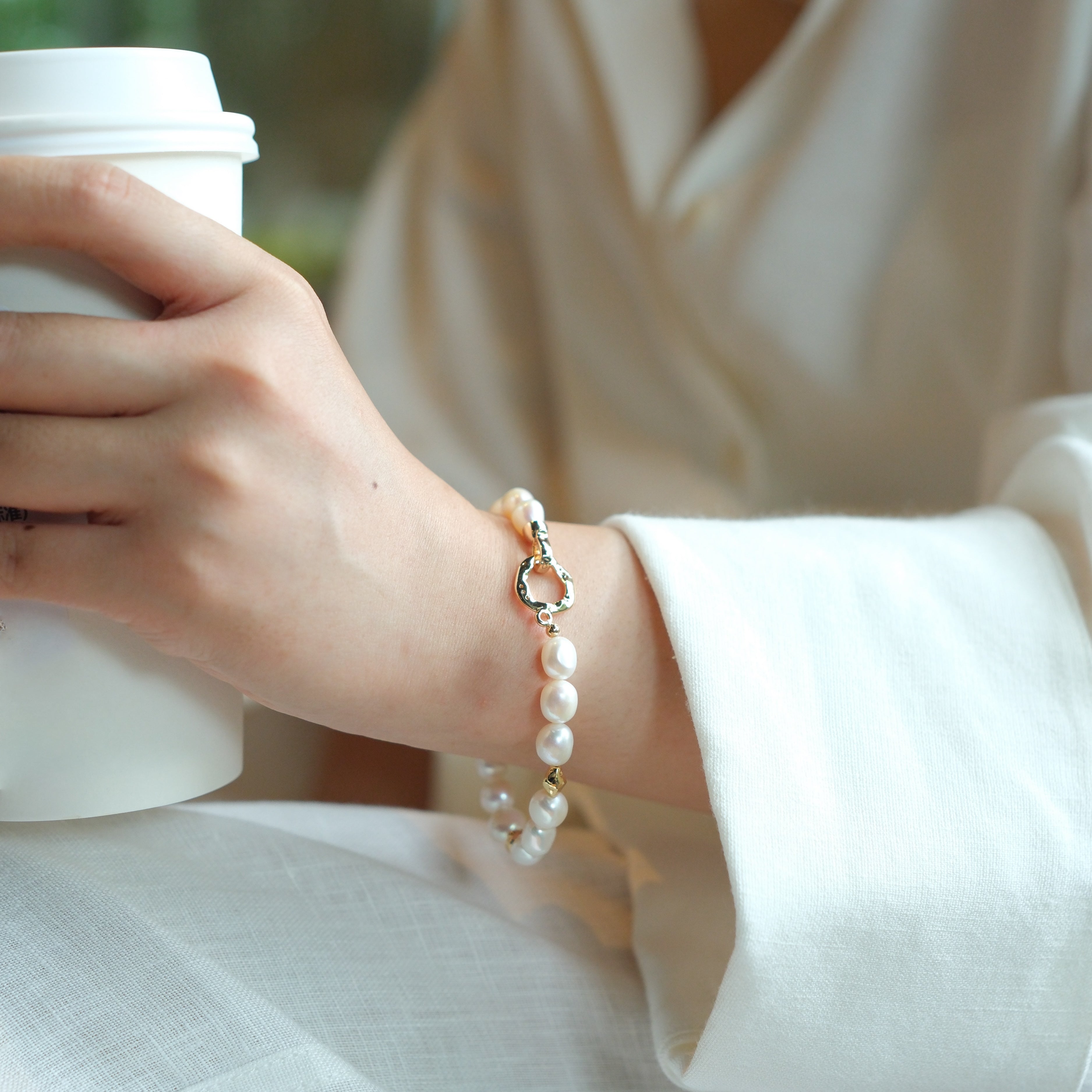 Freshwater Pearl Necklace and Bracelet Set | Versatile and Elegant | 18K Gold Filled | Gift for Her | Fall Outfit 
This set, featuring a smooth and lustrous collection of natural freshwater pearls, offers endless styling possibilities. Wear the necklace and bracelet separately or connect the clasps to create a chic long necklace. This versatile design is not only fun to wear but can be layered with one of our baroque pearl necklaces to create a more luxurious look. Whether worn individually or combined, the