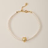 A symphony of contrasts, the Meiocardia Vulgaris Heart Bead Bracelet intertwines organic wonder with celestial elegance. Designed for those who wear their strength softly, this piece harmonizes the rare duality of nature’s hidden heart with the timeless glow of pearls.
Design & Craftsmanship:
- Dual-Perspective Heart Bead: At its center lies the 8.0*9.8mm Meiocardia vulgaris charm, 3D-modeled from a real shell scan. One angle reveals rugged, horn-like textures; the other, a smooth, luminous heart—symbolizin