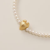 A symphony of contrasts, the Meiocardia Vulgaris Heart Bead Bracelet intertwines organic wonder with celestial elegance. Designed for those who wear their strength softly, this piece harmonizes the rare duality of nature’s hidden heart with the timeless glow of pearls.
Design & Craftsmanship:
- Dual-Perspective Heart Bead: At its center lies the 8.0*9.8mm Meiocardia vulgaris charm, 3D-modeled from a real shell scan. One angle reveals rugged, horn-like textures; the other, a smooth, luminous heart—symbolizin