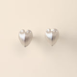 Embrace the celestial harmony of resilience and tenderness with our Petite Cœur Brillant Heart Earrings, inspired by the enigmatic Meiocardia vulgaris shell. Exquisitely crafted in 925 silver plated with luxurious 18k gold or white gold, these earrings feature a delicate heart silhouette (8.0*9.8mm). Each piece is a testament to meticulous artistry, born from 3D-scanned precision and hand-finished by master artisans.

Design Details & Materials:  
Dual-Tone Elegance: Choose between warm 18k gold or cool whi