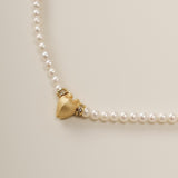 A delicate harmony of contrasts, the Petite Cœur Brillant Heart Necklace reimagines celestial elegance in a refined, wearable scale. Perfect for subtle sophistication, this piece balances organic charm and geometric precision, crafted for those who seek understated beauty with symbolic depth.
Design & Craftsmanship:
Miniature Dual-Texture Heart: The 8.0*9.8mm Meiocardia vulgaris pendant, cast in S925 silver and plated in 18k gold, features rugged shell-inspired edges that soften into a polished heart shape—