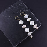 Unique Geometric Freshwater Pearl Dangle Earrings – A Fusion of Shapes and Elegance | Gift for Her | Fall Outfit 
These pearl earrings feature a striking design that harmoniously combines three different pearl shapes: a rhombus-shaped pearl, a square-shaped pearl, and a teardrop-shaped pearl. Despite their distinct forms, these pearls come together to create an elegant and balanced look that is both gentle and strong. Perfect for adding a touch of uniqueness to your everyday outfit